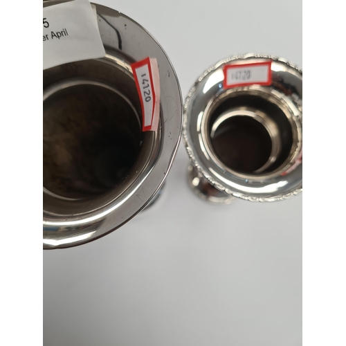 55 - Two silver vases, one by Sanders and Mackenzie, the other possibly S and C however, worn. One tapere... 