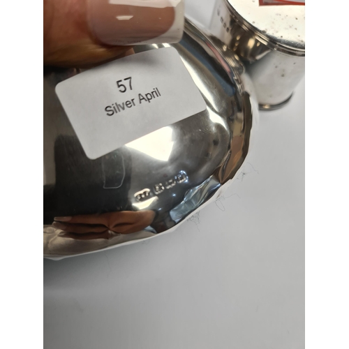 57 - A silver inkwell by Deakin and Francis Ltd., Birmingham 1921. Also with a silver mustard by Goldsmit... 