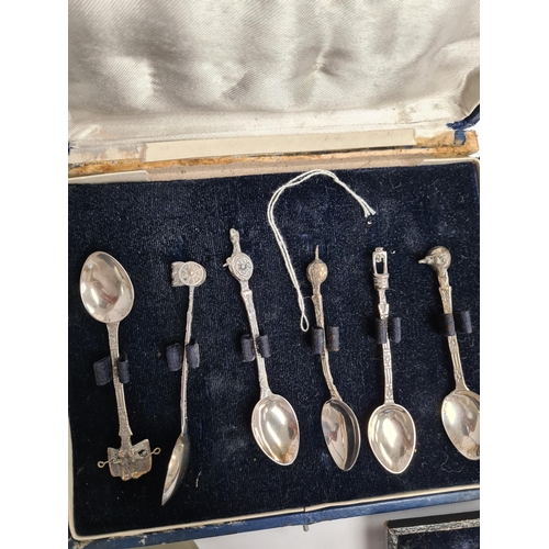 59 - A cased set of silver Industria Argentina teaspoons. And a cased medals, some silver, some Masonic r... 