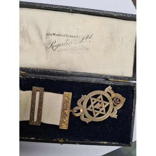 59 - A cased set of silver Industria Argentina teaspoons. And a cased medals, some silver, some Masonic r... 