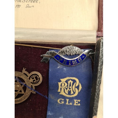 59 - A cased set of silver Industria Argentina teaspoons. And a cased medals, some silver, some Masonic r... 