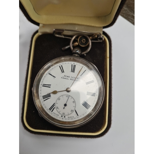 60 - A silver pocketwatch by H Samuel Ltd., a John William Barrett silver ashtray, and a very decorative ... 