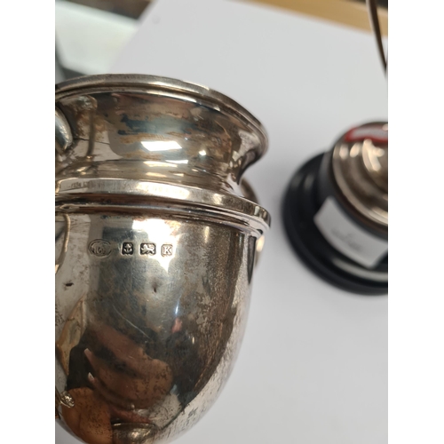 7 - Two silver trophy cups, one by Alexander Clark and Co Ltd., the other Elkington and Co Ltd., 1934 an... 