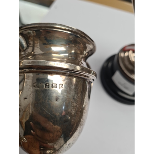 7 - Two silver trophy cups, one by Alexander Clark and Co Ltd., the other Elkington and Co Ltd., 1934 an... 