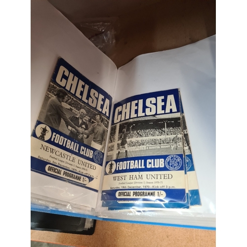 Two folders of football programmes including Chelsea FC and a bag of ...
