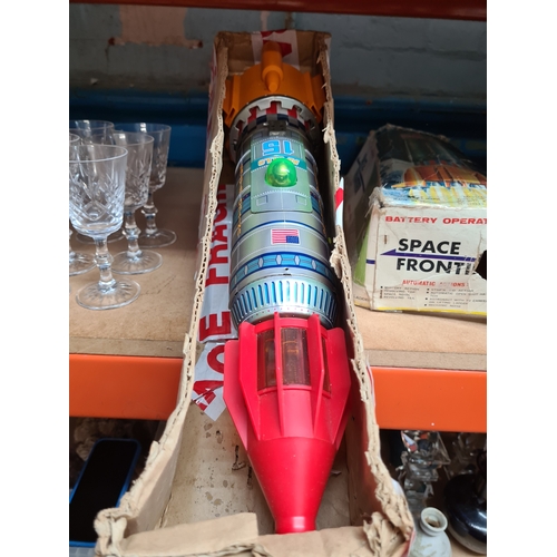 A retro Japanese tin plate rocket battery operated 'Space Frontier ...