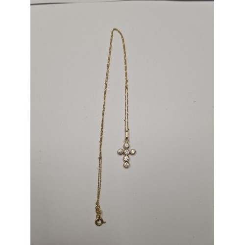 Fine 18ct yellow gold rope twist necklace hung with an 18ct gold cross pendant inset clear stones, marked 750, 2g