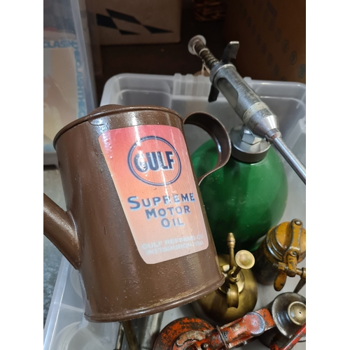 A small container of vintage oil cans and similar to include Redex ...