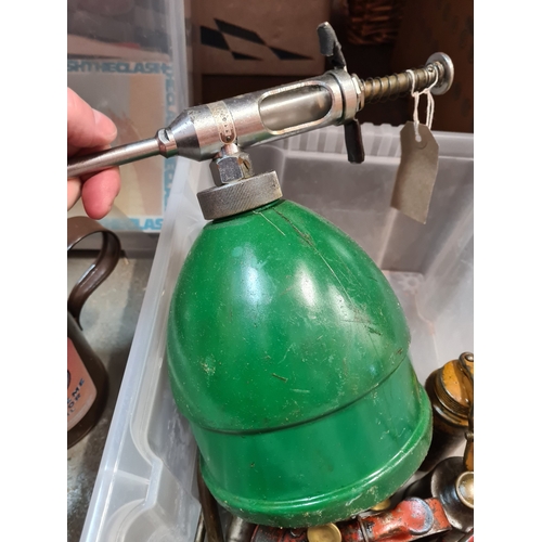A small container of vintage oil cans and similar to include Redex ...