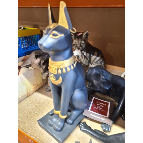 A collection of cat figures and similar including Guardian of the Nile ...