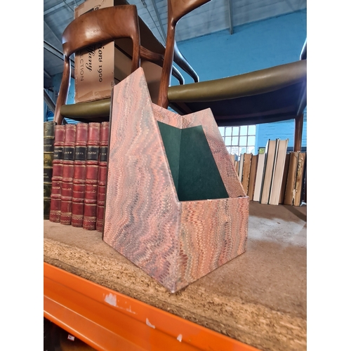 Assorted shelf boxes in the form of leather bound books