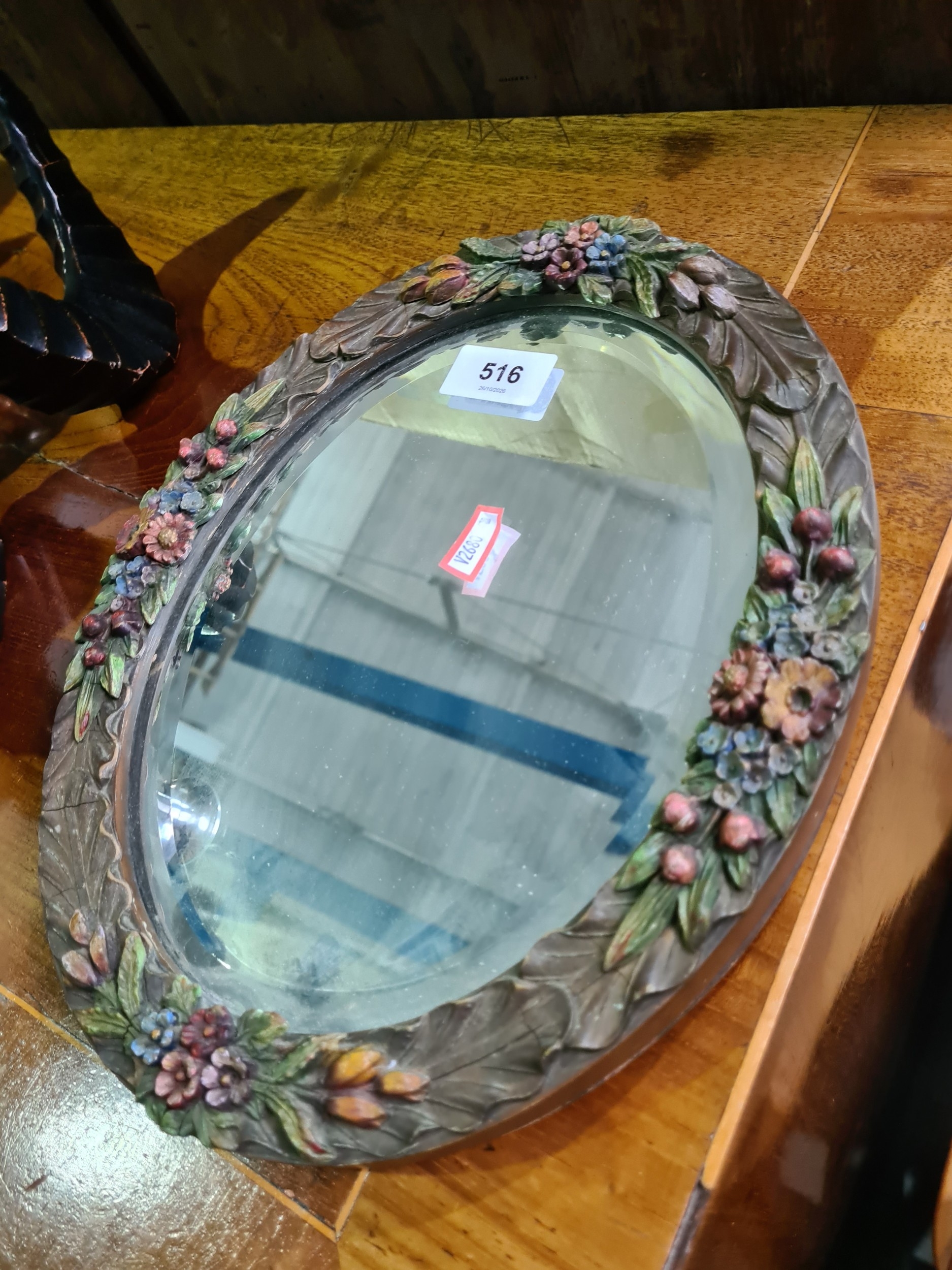 A vintage Barbola mirror having bevelled glass, 30.5cm