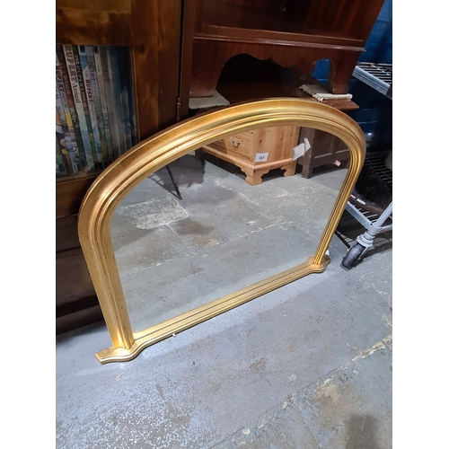 A modern gilt overmantle mirror, of Victorian style.