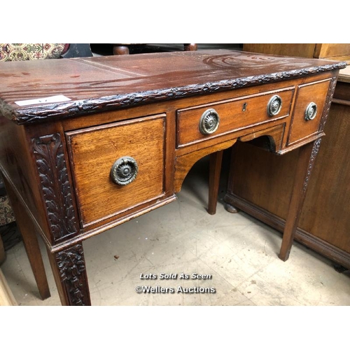 17 - DECORATIVELY CARVED SMALL DESK WITH THREE DRAWERS, 36 X 20 X 31.5 INCHES / LOCATED AT VICTORIA ANTIQ... 