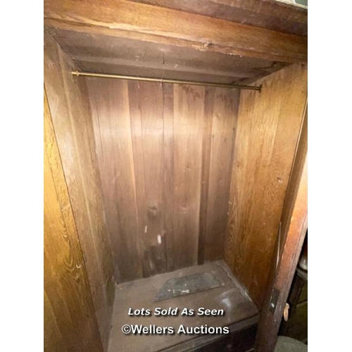 179 - OAK ARTS AND CRAFTS TWO DOOR WARDROBE (ONE GLAZED) OVER ONE DRAWER, 39 X 19 X 76 INCHES / LOCATED AT... 