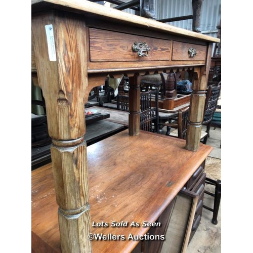 19 - PINE TABLE WITH TWO DRAWERS AND BRASS HANDLES, 51 X 27 X 31 INCHES / LOCATED AT VICTORIA ANTIQUES, W... 