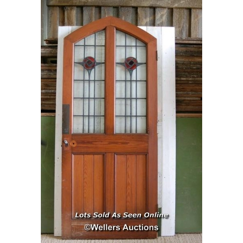 100 - Large pine stained glass arched door with Rennie Mackintosh style leaded glass. Small cracks to glas... 