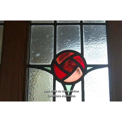 100 - Large pine stained glass arched door with Rennie Mackintosh style leaded glass. Small cracks to glas... 