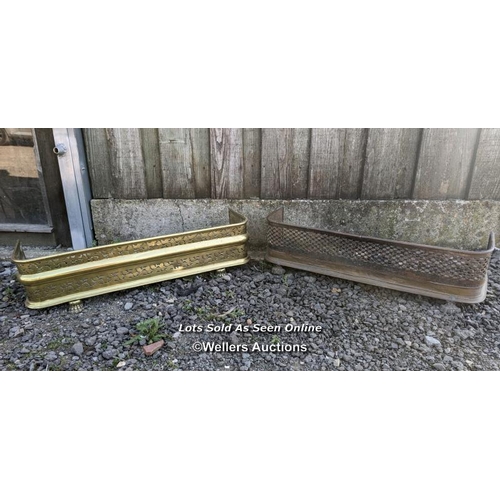 27 - 2 brass fire fenders. Polished fender is 87cm x 31cm. Unpolished fender is 82cm x 25cm