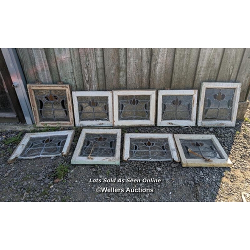 4 - 9 stained glass panels in pine frames. 2 frames missing one side. For restoration. Some breaks in th... 