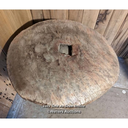 48 - A very large grain mortar. West African. Hardwood. The lid (75cm across) had a hole, now patched in ... 