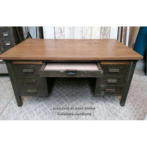 49 - A vintage metal knee hole desk with later oak top. 157cm W x 76cm H x 89cm D. Some marks, ex shop di... 