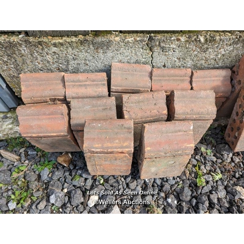 7 - 15 shaped curb bricks and three decorative ridge tiles