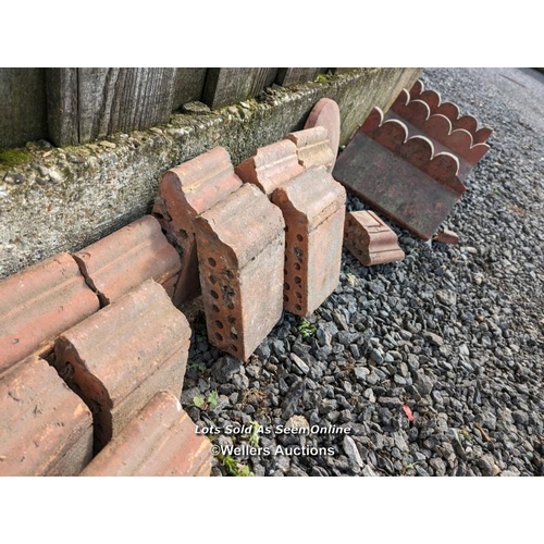 7 - 15 shaped curb bricks and three decorative ridge tiles