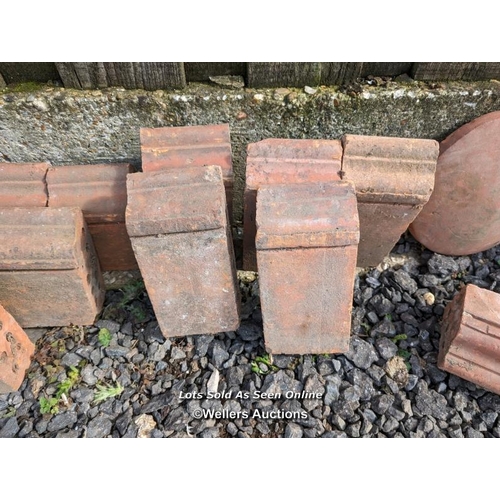 7 - 15 shaped curb bricks and three decorative ridge tiles