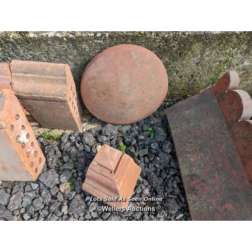 7 - 15 shaped curb bricks and three decorative ridge tiles