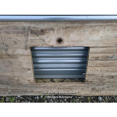 74 - Teak worktop with sink cut out. 204cm long. Depth 48cm to 52cm. Thickness 2.7cm. Length to sink hole... 