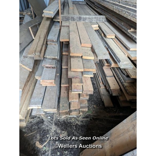 81 - Reclaimed pine. 10m2 parcel of wood. Cut from Victorian joists. Many have 'wattle and daub' lines on... 