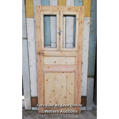 99 - Victorian pine door from France with opening window section. Size 81.5cm x 195cm x 3cm thick.