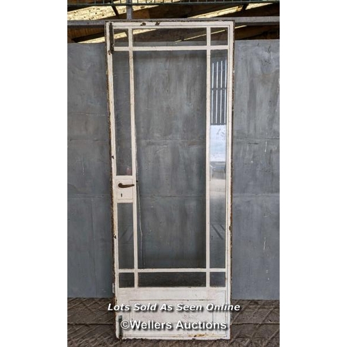 178 - Crittal metal door in its frame with bolts and working handle. No key. Glass missing. For restoratio... 