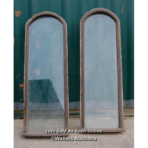 180 - Pair of arched timber windows. Some damage to the glass. 66cm W x 194cm H x 9cm D