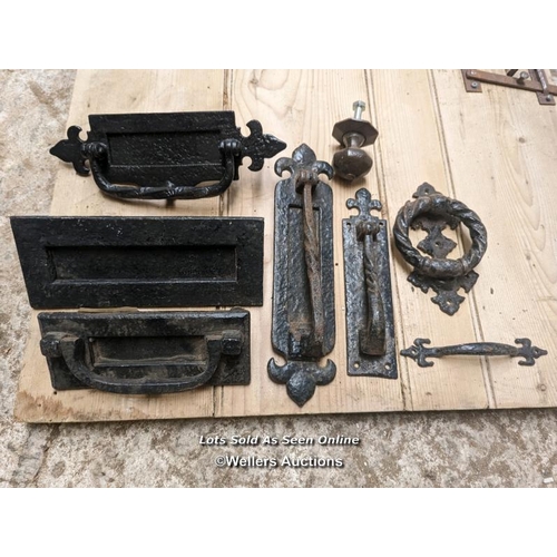 207 - Selection of cast iron front door furniture including letterboxes, knockers, door pulls.