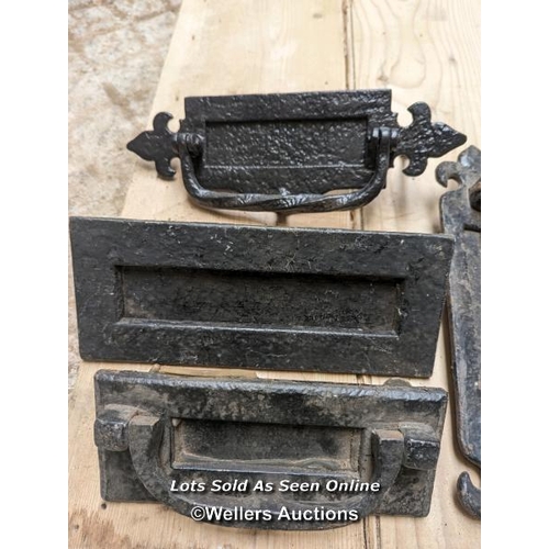 207 - Selection of cast iron front door furniture including letterboxes, knockers, door pulls.