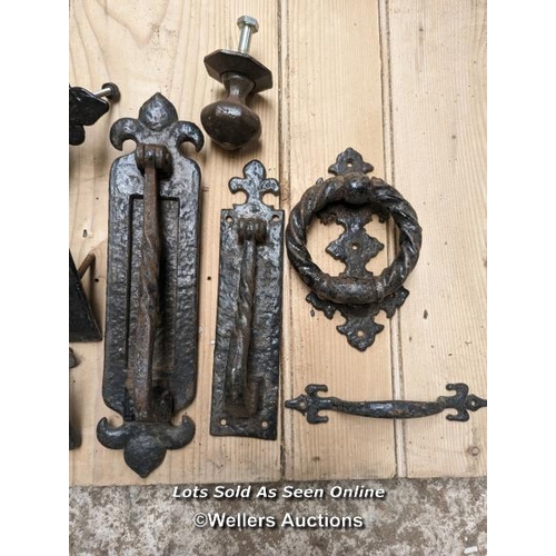 207 - Selection of cast iron front door furniture including letterboxes, knockers, door pulls.