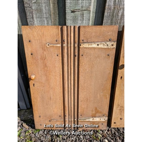 241 - 3 Arts and crafts solid oak plank cupboard doors. 2 at 68cm W x 78cm T and one at 59cm W x 79cm T