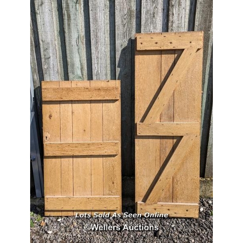 243 - 2 arts and crafts oak solid oak plank doors. 60cm x 171cm and 75cm x 130cm