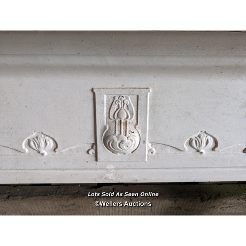 254 - Art Nouveau cast iron fireplace surround. Painted white C1910. Mantel width 111cm. Body width 91.5cm... 