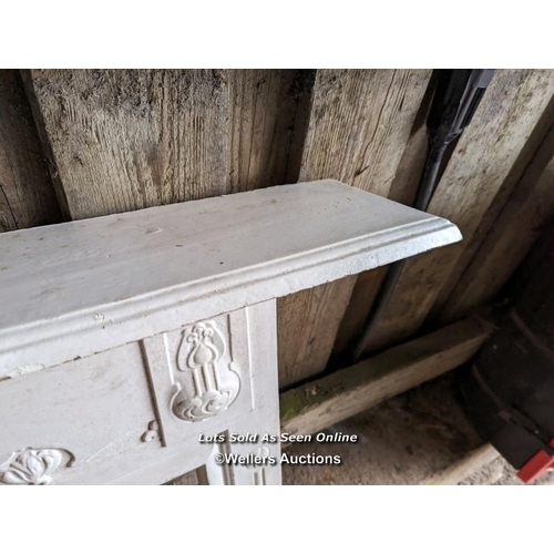 254 - Art Nouveau cast iron fireplace surround. Painted white C1910. Mantel width 111cm. Body width 91.5cm... 