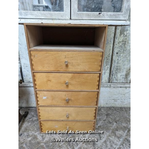 258 - An oval mirror on stand, a set of drawers (top drawer missing) and a glazed wall cupboard with mirro... 