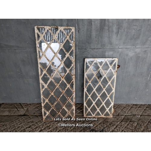 259 - A pair of Victorian diamond cast iron windows for restoration. No frames. Sizes 41cm x 114cm and 38c... 