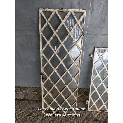 259 - A pair of Victorian diamond cast iron windows for restoration. No frames. Sizes 41cm x 114cm and 38c... 