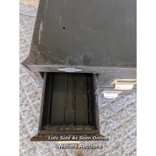 262 - 2 metal four drawer filing cabinets C1930 with brass handles/card holders. Some rust and paint loss