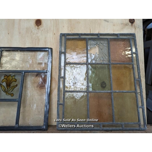 274 - 8 pieces of leaded coloured glass. Two with handpainted centre pieces. Some breaks in the larger pan... 