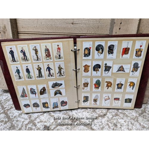 276 - An album of military cigarette cards of uniforms and Regiments of the British Army. Plus 26 Vintage ... 