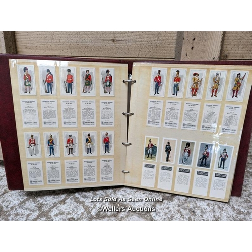 276 - An album of military cigarette cards of uniforms and Regiments of the British Army. Plus 26 Vintage ... 