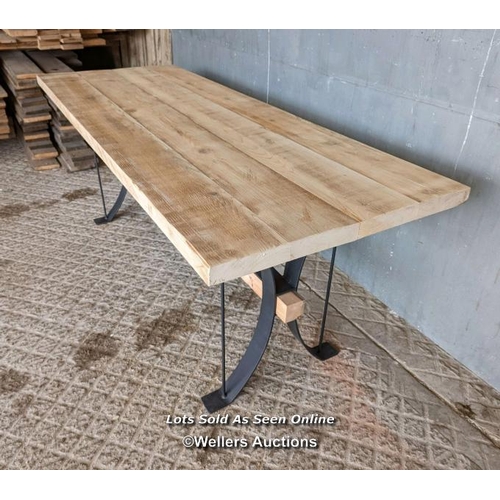 279 - Dining table with wrought iron base and reclaimed pine top and stretcher. 8 seater. 198cm L x 78cm W... 